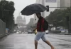 Em dia de chuva forte, capital fluminense tem ruas vazias